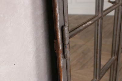 close up of cast iron mirrored window edge